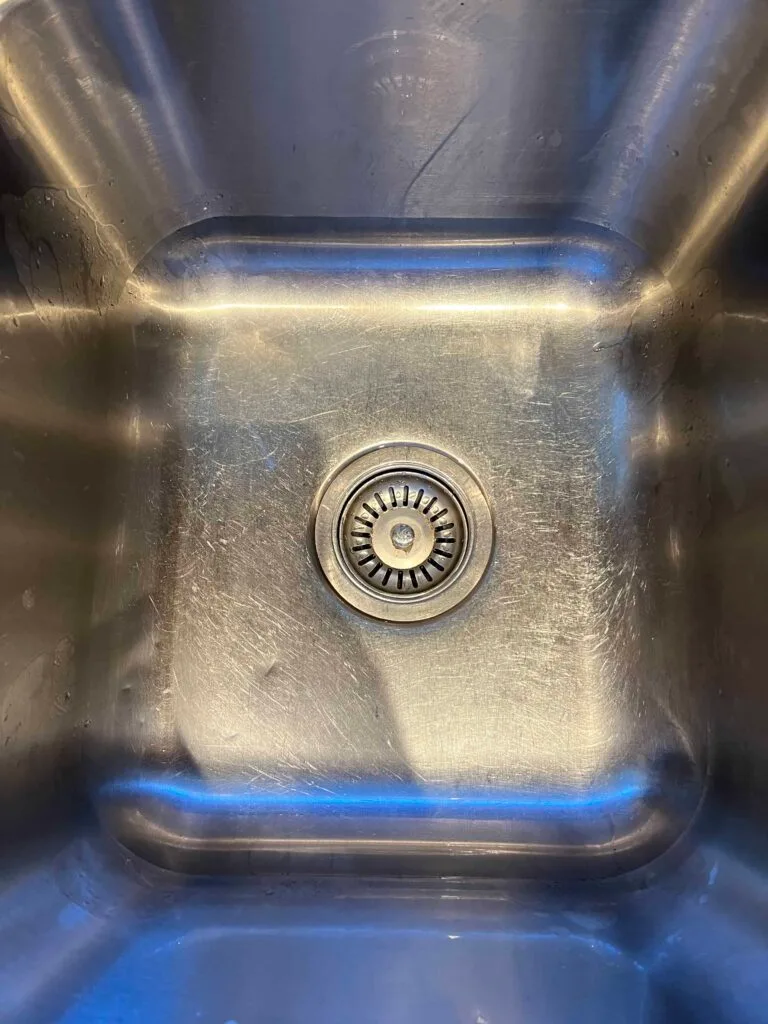 clean kitchen sink after using this  DIY dish soap recipe