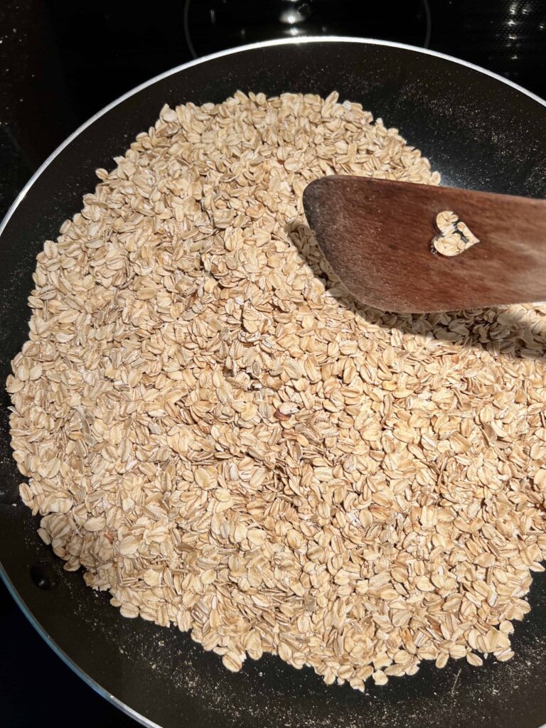 toasting old fashioned oats on a pan