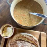 Healthy split pea soup with fresh baked bread