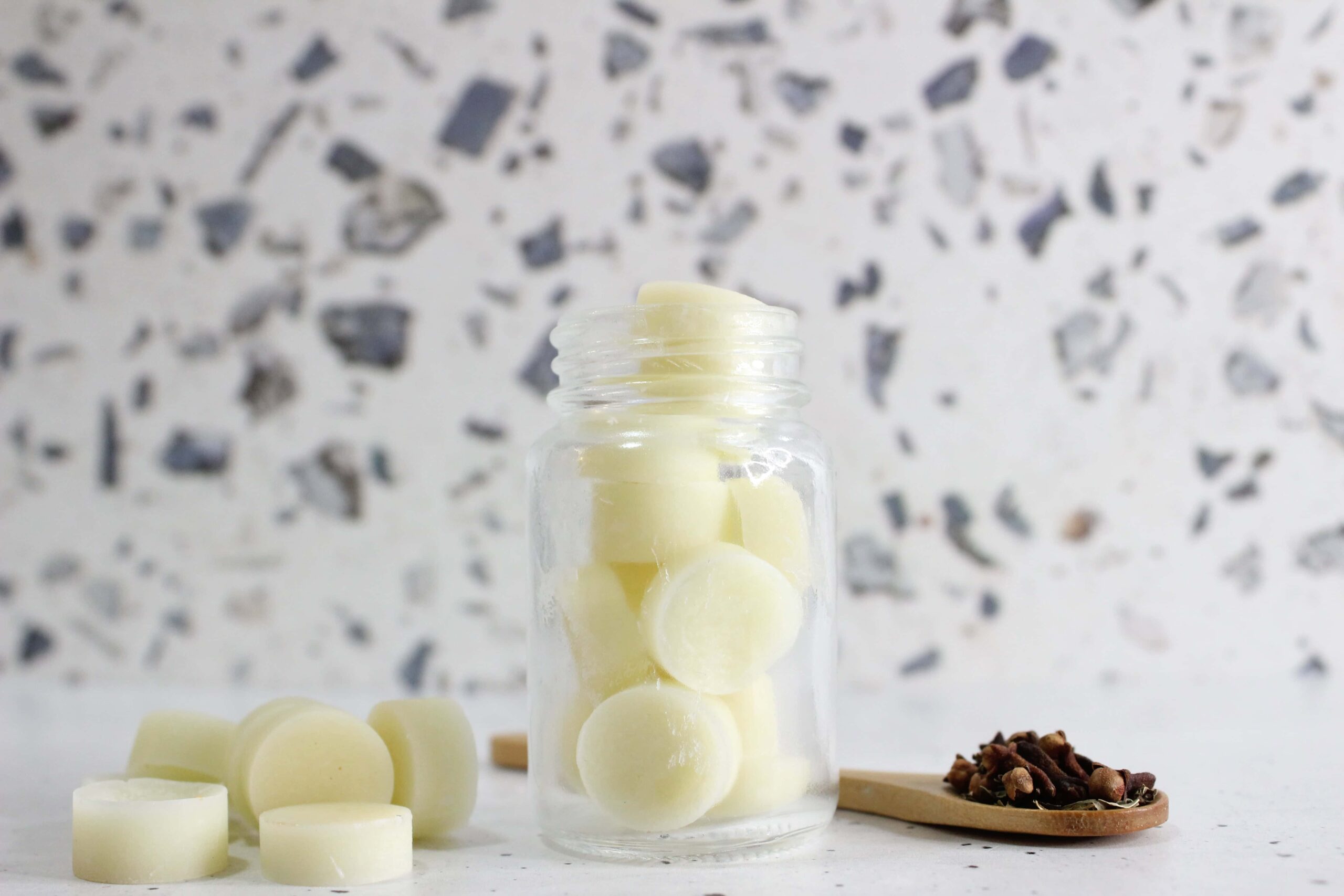 oil pulling cubes displayed in a glass jar