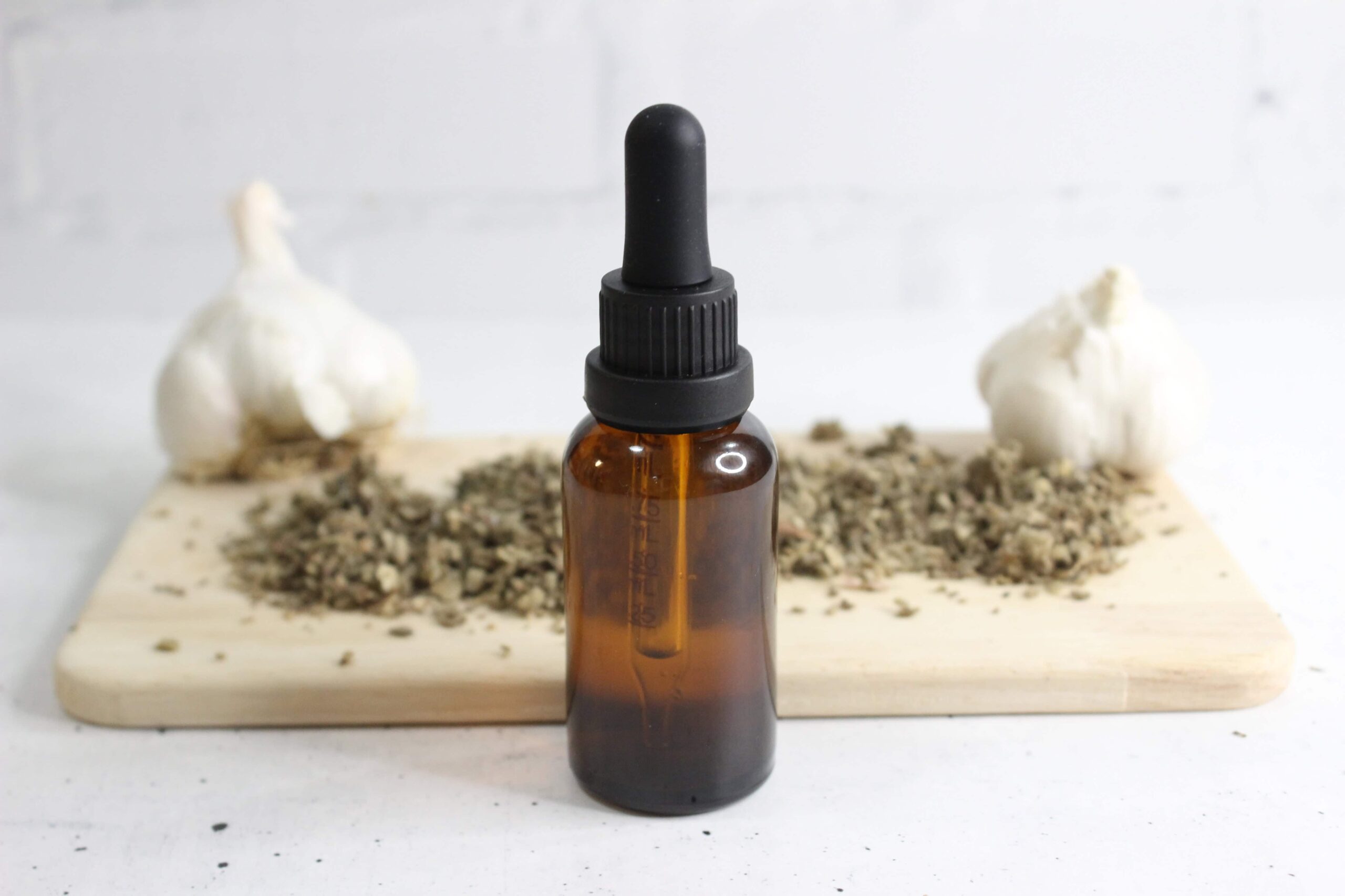 Ear oil in a glass dropper bottle