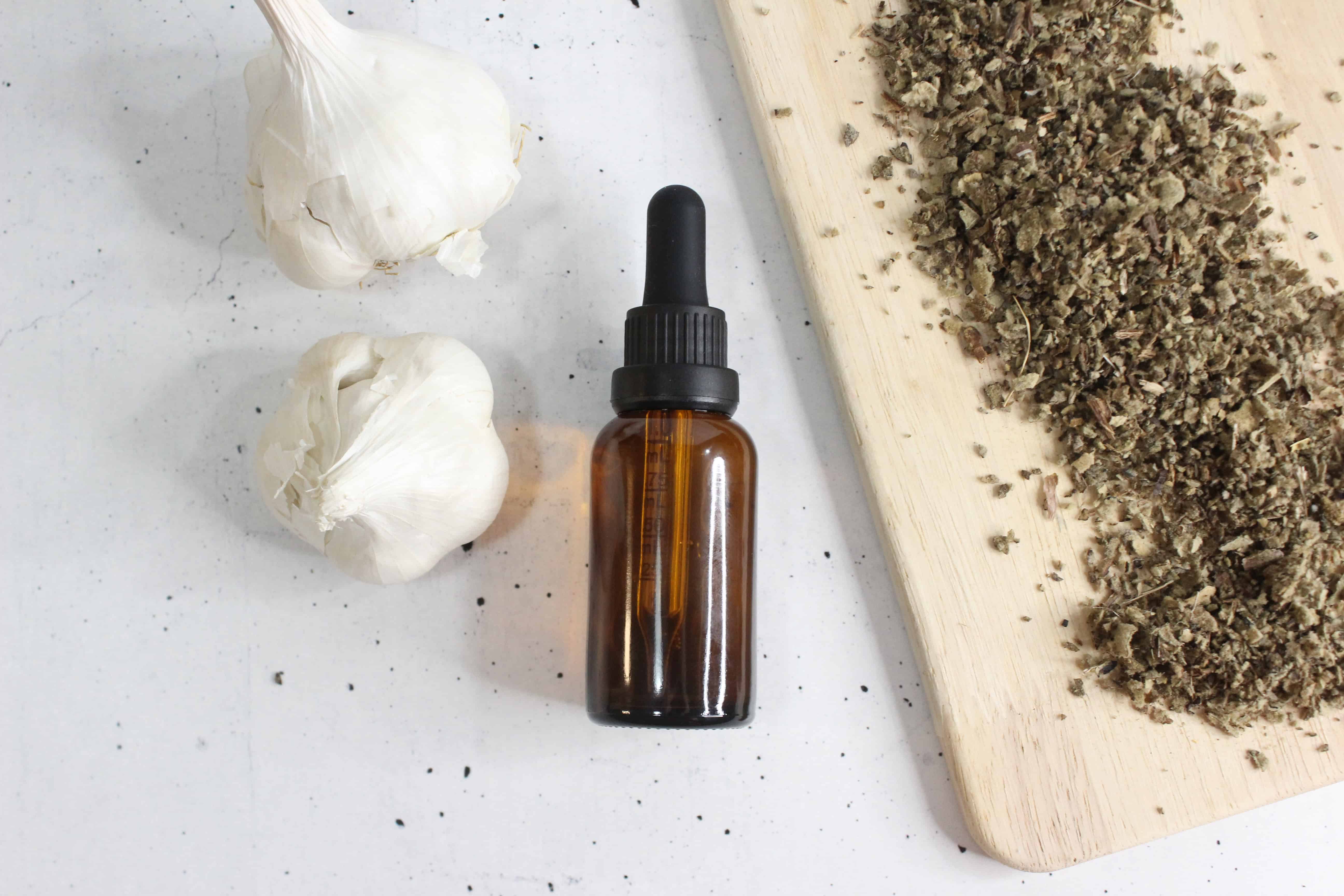 diy ear oil displayed on a white background