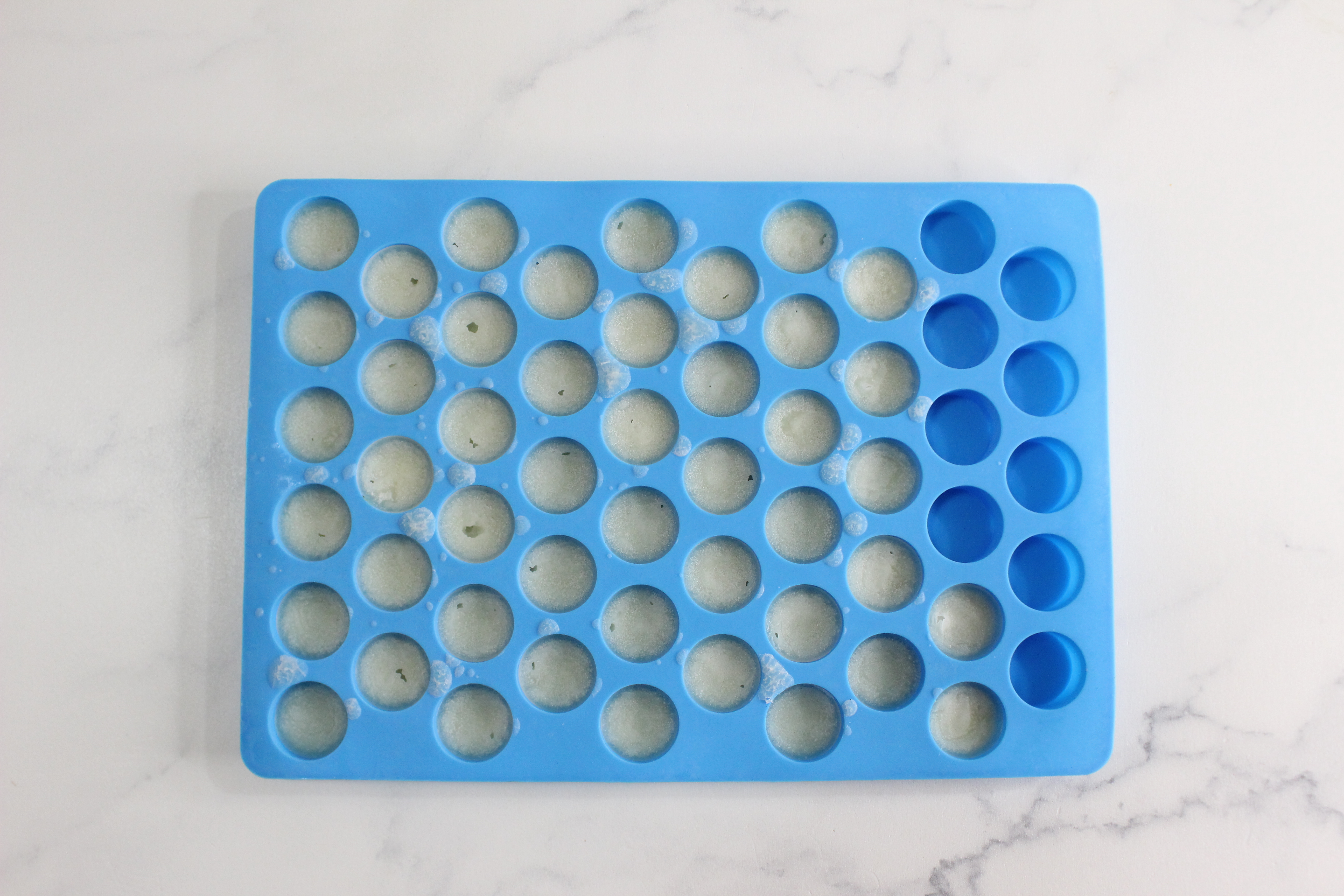 coconut oil pulling tablets in a silicone mold